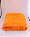 Оранжевое махровое полотенце